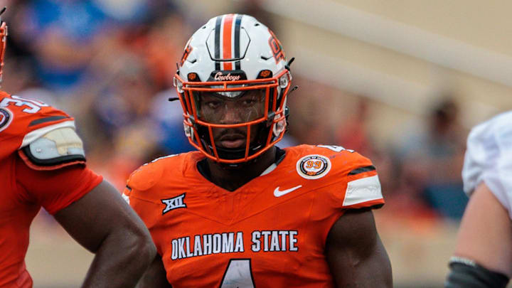 Aug 31, 2024; Stillwater, Oklahoma, USA; Oklahoma State Cowboys linebacker Nick Martin (4) ready for a play during the fourth quarter against the South Dakota State Jackrabbits at Boone Pickens Stadium. Mandatory Credit: William Purnell-Imagn Images
