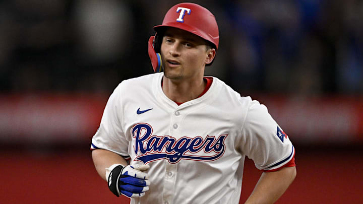 Jun 28, 2025; Arlington, Texas, USA; Texas Rangers shortstop Corey Seager (5) rounds the bases after he hits a two run home run against the Seattle Mariners during the third inning at Globe Life Field