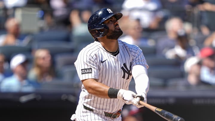 Aug 27, 2025; Bronx, New York, USA; New York Yankees left fielder Jasson Dominguez (24) hits a double against the Washington Nationals during the third inning at Yankee Stadium. Mandatory Credit: Gregory Fisher-Imagn Images