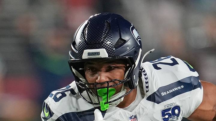 Seattle Seahawks running back Zach Charbonnet rushes the ball