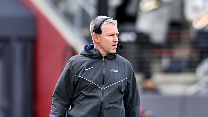 Oct 25, 2025; Pullman, Washington, USA; Toledo Rockets head coach Jason Candle walks the sideline against the Washington State Cougars in the first half at Gesa Field at Martin Stadium. Mandatory Credit: James Snook-Imagn Images