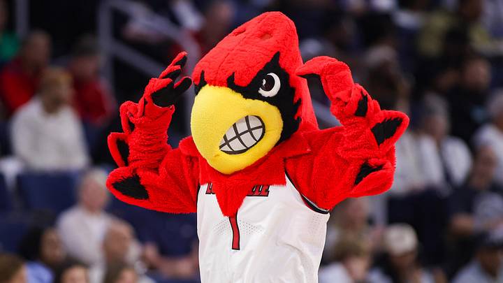 Mar 7, 2026; Duluth, GA, USA; Louisville Cardinals mascot Louie on the court against the North Carolina Tar Heels in the second quarter at Gas South Arena. Mandatory Credit: Brett Davis-Imagn Images Mar 7, 2026; Duluth, GA, USA; Louisville Cardinals mascot Louie on the court against the North Carolina Tar Heels in the second quarter at Gas South Arena. Mandatory Credit: Brett Davis-Imagn Images