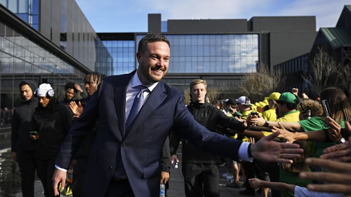 Oct 26, 2024; Eugene, Oregon, USA; Oregon Ducks head coach Dan Lanning greets fans before a game against the Illinois Fighting Illini at Autzen Stadium. Mandatory Credit: Troy Wayrynen-Imagn Images