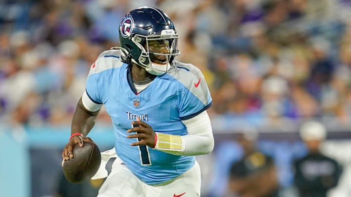Tennessee Titans quarterback Cam Ward (1) runs the ball during the second quarter of an NFL pre-season game against the Minnesota Vikings at Nissan Stadium in Nashville, Tenn., Friday, Aug. 22, 2025.