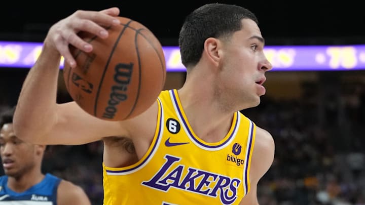 Los Angeles Lakers forward Cole Swider (20) dribbles against the Minnesota Timberwolves during a preseason game at T-Mobile Arena. 