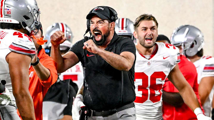 Ohio State's head coach Ryan Day, center, celebrates after the Buckeyes stop Michigan State on fourth down and one yard during the first quarter on Saturday, Sept. 28, 2024, at Spartan Stadium in East Lansing. Ohio State's head coach Ryan Day, center, celebrates after the Buckeyes stop Michigan State on fourth down and one yard during the first quarter on Saturday, Sept. 28, 2024, at Spartan Stadium in East Lansing.