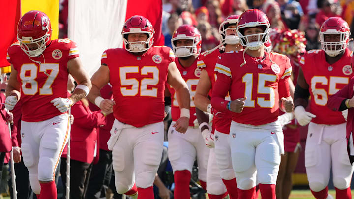 Nov 23, 2025; Kansas City, Missouri, USA; Kansas City Chiefs tight end Travis Kelce (87) and center Creed Humphrey (52) and quarterback Patrick Mahomes (15) run onto the field before the game against the Indianapolis Colts at GEHA Field at Arrowhead Stadium. Mandatory Credit: Denny Medley-Imagn Images