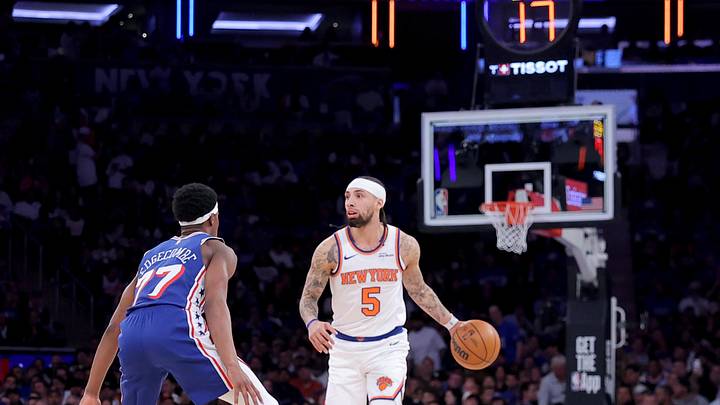May 4, 2026; New York, New York, USA; New York Knicks guard Jose Alvarado (5) brings the ball up court against Philadelphia 76ers guard VJ Edgecombe (77) during the second quarter of game one of the eastern conference semifinal round of the 2026 NBA Playoffs at Madison Square Garden. Mandatory Credit: Brad Penner-Imagn Images