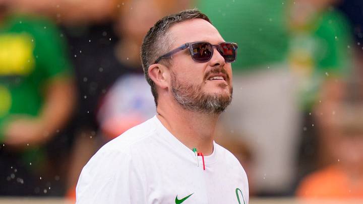Oregon head coach Dan Lanning takes in the rain as the Oregon Ducks face the Oklahoma State Cowboys on Sept. 12, 2026, at Boone Pickens Stadium in Stillwater, Oklahoma.