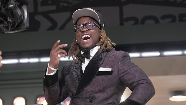 Boise State Broncos running back Ashton Jeanty poses after being selected by the Las Vegas Raiders as the number six pick in the first round of the 2025 NFL Draft at Lambeau Field.