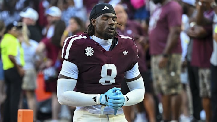 Oct 11, 2025; College Station, Texas, USA; Texas A&M Aggies running back Le'Veon Moss (8) takes a moment prior to the game against the Florida Gators at Kyle Field. Mandatory Credit: Maria Lysaker-Imagn Images 