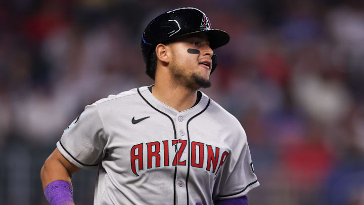 Jun 3, 2025; Atlanta, Georgia, USA; Arizona Diamondbacks catcher Gabriel Moreno (14) hits a single against the Atlanta Braves in the ninth inning at Truist Park. Mandatory Credit: Brett Davis-Imagn Images Jun 3, 2025; Atlanta, Georgia, USA; Arizona Diamondbacks catcher Gabriel Moreno (14) hits a single against the Atlanta Braves in the ninth inning at Truist Park. Mandatory Credit: Brett Davis-Imagn Images