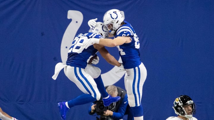 Jan 3, 2021; Indianapolis, Indiana, USA; Indianapolis Colts running back Jonathan Taylor (28) celebrates a touchdown with tight end Jack Doyle (84) in the second half against the Jacksonville Jaguars at Lucas Oil Stadium. Jan 3, 2021; Indianapolis, Indiana, USA; Indianapolis Colts running back Jonathan Taylor (28) celebrates a touchdown with tight end Jack Doyle (84) in the second half against the Jacksonville Jaguars at Lucas Oil Stadium.