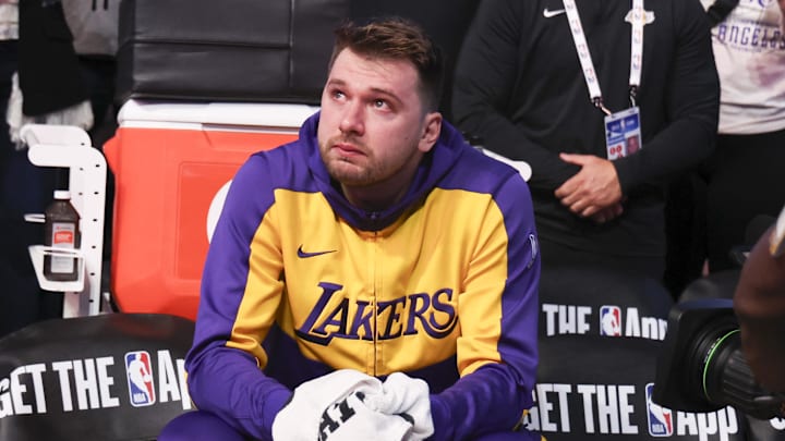 Apr 9, 2025; Dallas, Texas, USA;  Los Angeles Lakers guard Luka Doncic (77) reacts while watching a tribute video before the game against the Dallas Mavericks at American Airlines Center. Mandatory Credit: Kevin Jairaj-Imagn Images