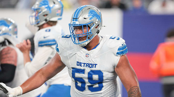 Detroit Lions offensive tackle Giovanni Manu (59) blocks during the second half against the New York Giants Detroit Lions offensive tackle Giovanni Manu (59) blocks during the second half against the New York Giants