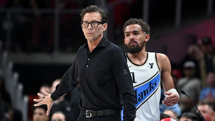 Atlanta Hawks head coach Quin Snyder signals Trae Young #11 against the Indiana Pacers.