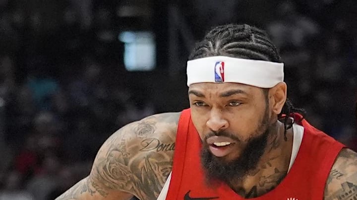 Toronto Raptors forward Brandon Ingram drives the the basket against Detroit Pistons guard Cade Cunningham.