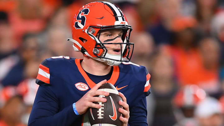 Nov 30, 2024; Syracuse, New York, USA; Syracuse Orange quarterback Kyle McCord (6) drops back to pass against the Miami Hurricanes during the first half at the JMA Wireless Dome. Mandatory Credit: Rich Barnes-Imagn Images Nov 30, 2024; Syracuse, New York, USA; Syracuse Orange quarterback Kyle McCord (6) drops back to pass against the Miami Hurricanes during the first half at the JMA Wireless Dome. Mandatory Credit: Rich Barnes-Imagn Images