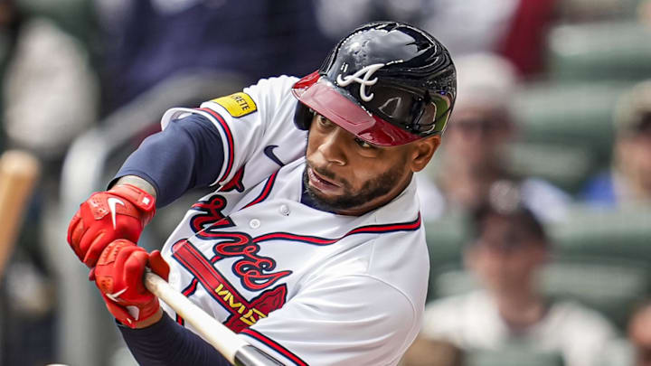 Mar 29, 2026; Cumberland, Georgia, USA; Atlanta Braves outfielder Dominic Smith (8) singles against the Kansas City Royals during the fifth inning at Truist Park. Mandatory Credit: Dale Zanine-Imagn Images