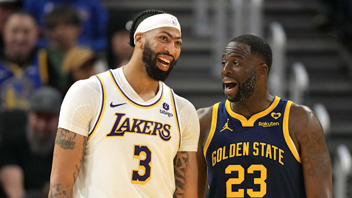 Jan 27, 2024; San Francisco, California, USA; Los Angeles Lakers forward Anthony Davis (3) and Golden State Warriors forward Draymond Green (23) talk during the third quarter at Chase Center. Mandatory Credit: Darren Yamashita-Imagn Images