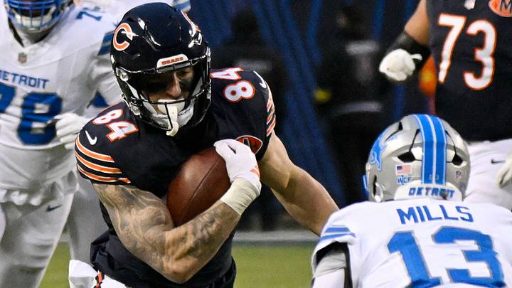 Chicago Bears tight end Colston Loveland (84) runs with the ball against Detroit Lions safety Jalen Mills (13) Chicago Bears tight end Colston Loveland (84) runs with the ball against Detroit Lions safety Jalen Mills (13)
