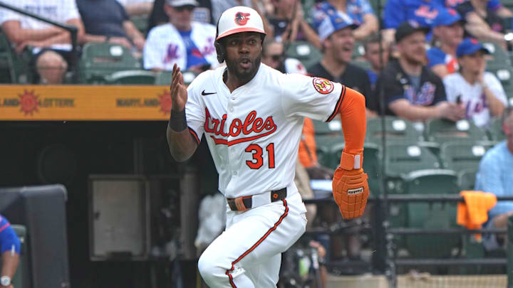 Jul 10, 2025; Baltimore, MD, USA; Baltimore Orioles outfielder Cedric Mullins (31) rounds third base to score during the second inning against the New York Mets at Oriole Park at Camden Yards. 