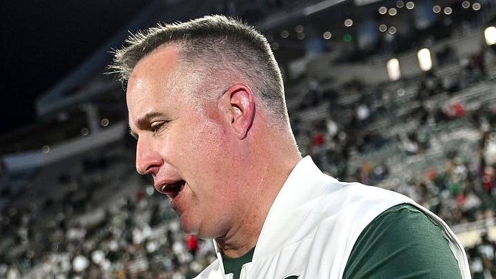 Michigan State’s head coach Pat Fitzgerald, right, shakes hands with Nebraska head coach Matt Rhule after the game on Saturday, Sept. 26, 2026, in East Lansing.