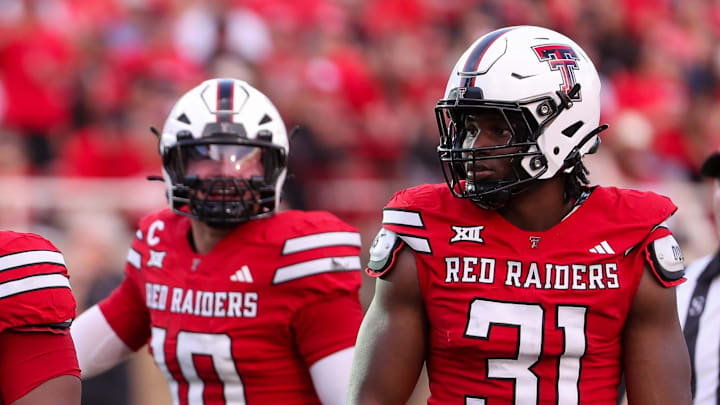 Texas Tech's Skyler Gill-Howard (0), David Bailey (31) and Jacob Rodriguez prepare to play defense against Arkansas-Pine Bluff during a non-conference football game, Saturday, August 30, 2025, at Jones AT&T Stadium.