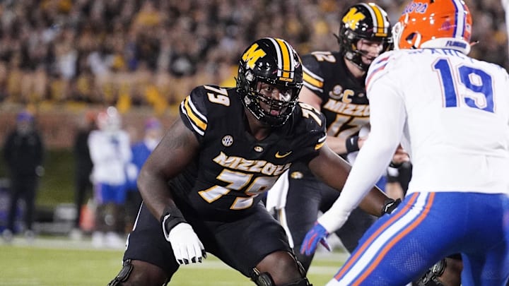 Nov 18, 2023; Columbia, Missouri, USA; Missouri Tigers offensive lineman Armand Membou (79) at the line of scrimmage against the Florida Gators during the game at Faurot Field at Memorial Stadium. Mandatory Credit: Denny Medley-Imagn Images