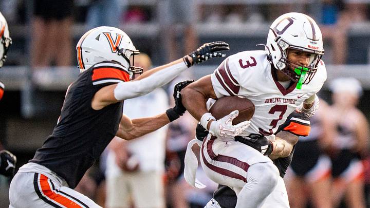 Dowling Catholic wide receiver Jeffrey Roberts (3) attempts to shake off defenders during a high school football game between Valley and Dowling Catholic on Aug. 29, 2025, at Valley Stadium in West Des Moines, Iowa. Valley defeated Dowling Catholic 20-19. Dowling Catholic wide receiver Jeffrey Roberts (3) attempts to shake off defenders during a high school football game between Valley and Dowling Catholic on Aug. 29, 2025, at Valley Stadium in West Des Moines, Iowa. Valley defeated Dowling Catholic 20-19.