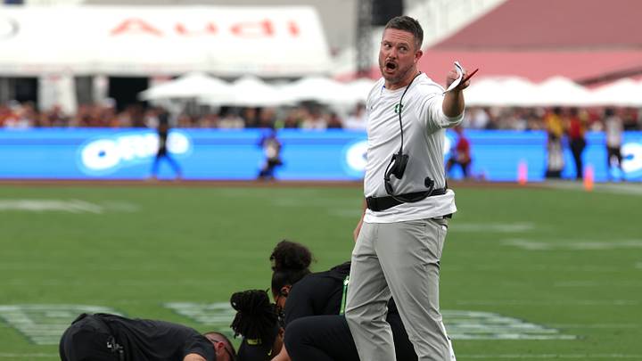 Sep 26, 2026; Los Angeles, California, USA; Oregon Ducks head coach Dan Lanning reacts as quarterback Dante Moore (5) lies on the field with an apparent injury after being tackled by USC Trojans linebacker Desman Stephens II (not pictured) during the second quarter at United Airlines Field at Los Angeles Memorial Coliseum. Stephens II was charged with targeting on the play. Mandatory Credit: Kiyoshi Mio-Imagn Images Sep 26, 2026; Los Angeles, California, USA; Oregon Ducks head coach Dan Lanning reacts as quarterback Dante Moore (5) lies on the field with an apparent injury after being tackled by USC Trojans linebacker Desman Stephens II (not pictured) during the second quarter at United Airlines Field at Los Angeles Memorial Coliseum. Stephens II was charged with targeting on the play. Mandatory Credit: Kiyoshi Mio-Imagn Images