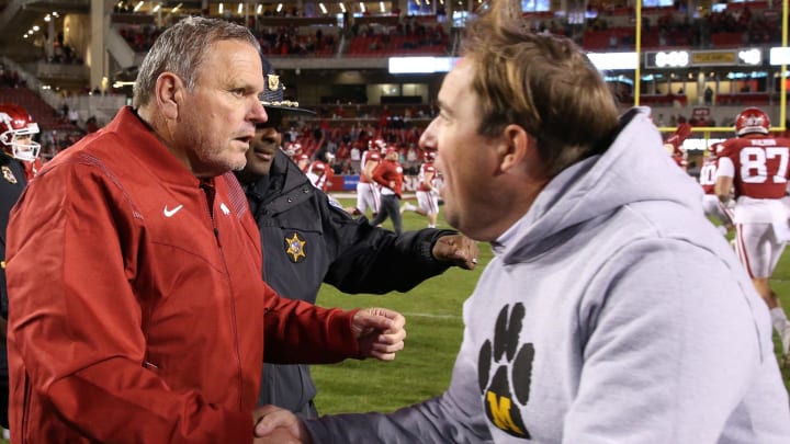 Arkansas Razorbacks coach Sam Pittman shakes hands with Missouri Tigers coach Eil Drinkwitz after the game at Razorback Stadium. Arkansas won 34-17. Arkansas Razorbacks coach Sam Pittman shakes hands with Missouri Tigers coach Eil Drinkwitz after the game at Razorback Stadium. Arkansas won 34-17.