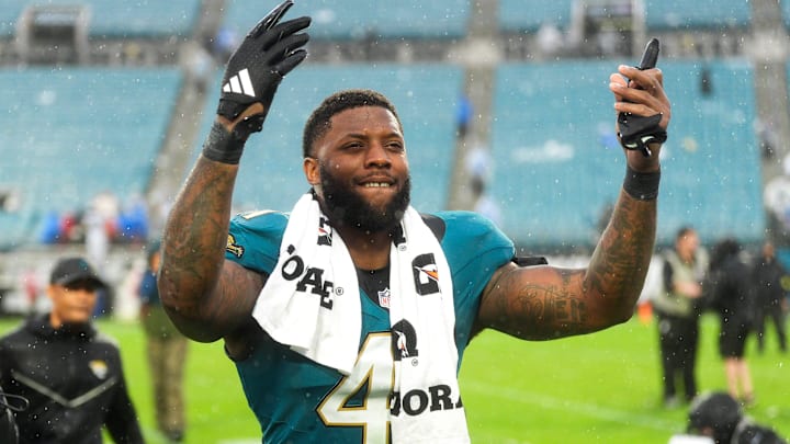 Jacksonville Jaguars defensive end Josh Hines-Allen (41) celebrates as he runs off the field after defeating the Colts during an NFL football game at EverBank Stadium, Sunday, Dec. 7, 2025, in Jacksonville, Fla. Jaguars won 36-19[Doug Engle/Florida Times-Union]