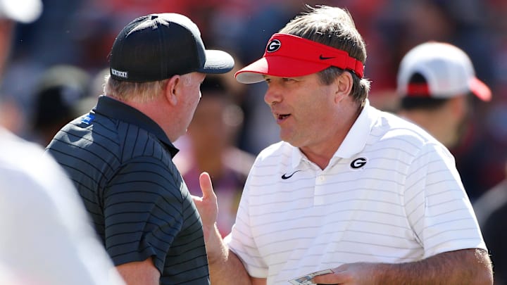 Georgia coach Kirby Smart speaks with Kentucky coach Mark Stoops before an NCAA college football game between Kentucky and Georgia in Athens, Ga., on Saturday, Oct. 16, 2021.
News Joshua L Jones Georgia coach Kirby Smart speaks with Kentucky coach Mark Stoops before an NCAA college football game between Kentucky and Georgia in Athens, Ga., on Saturday, Oct. 16, 2021.
News Joshua L Jones