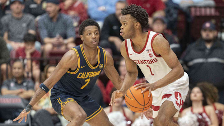 Stanford guard Ebuka Okorie (1) is defended by Cal's Dai Dai Ames