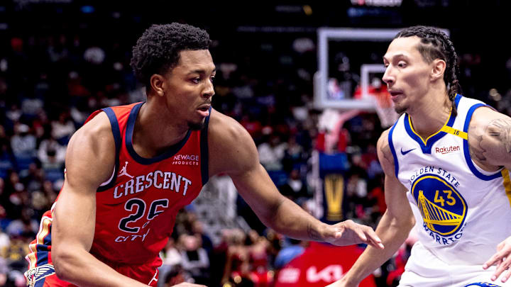 Nov 22, 2024; New Orleans, Louisiana, USA; New Orleans Pelicans guard Trey Murphy III (25) dribbles against Golden State Warriors forward Lindy Waters III (43) during first half at Smoothie King Center. Mandatory Credit: Stephen Lew-Imagn Images Nov 22, 2024; New Orleans, Louisiana, USA; New Orleans Pelicans guard Trey Murphy III (25) dribbles against Golden State Warriors forward Lindy Waters III (43) during first half at Smoothie King Center. Mandatory Credit: Stephen Lew-Imagn Images