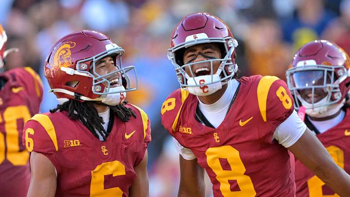 Oct 11, 2025; Los Angeles, California, USA; USC Trojans wide receiver Ja'Kobi Lane (8) is congratulated by wide receiver Makai Lemon (6) after catching a touchdown pass in the first half at United Airlines Field at the Los Angeles Memorial Coliseum. Mandatory Credit: Jayne Kamin-Oncea-Imagn Images Oct 11, 2025; Los Angeles, California, USA; USC Trojans wide receiver Ja'Kobi Lane (8) is congratulated by wide receiver Makai Lemon (6) after catching a touchdown pass in the first half at United Airlines Field at the Los Angeles Memorial Coliseum. Mandatory Credit: Jayne Kamin-Oncea-Imagn Images