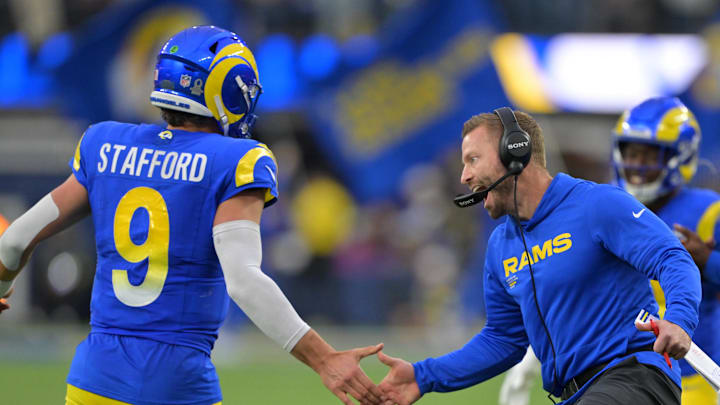 Jan 4, 2026; Inglewood, California, USA; Los Angeles Rams head coach Sean McVay reacts with quarterback Matthew Stafford (9) after a touchdown against the Arizona Cardinals during the second half at SoFi Stadium. Mandatory Credit: Jayne Kamin-Oncea-Imagn Images Jan 4, 2026; Inglewood, California, USA; Los Angeles Rams head coach Sean McVay reacts with quarterback Matthew Stafford (9) after a touchdown against the Arizona Cardinals during the second half at SoFi Stadium. Mandatory Credit: Jayne Kamin-Oncea-Imagn Images