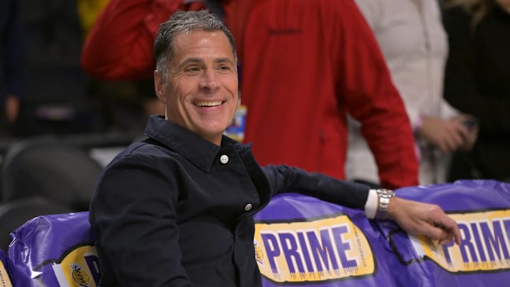 Nov 21, 2024; Los Angeles, California, USA;  Los Angeles Lakers general manager Rob Pelinka looks on as players warm up prior to the game against the Orlando Magic at Crypto.com Arena. Mandatory Credit: Jayne Kamin-Oncea-Imagn Images