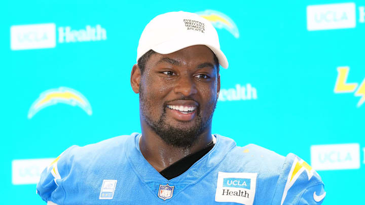Jul 25, 2025; El Segundo, CA, USA; Los Angeles Chargers guard Zion Johnson (77) during training camp press conference at The Bolt. Mandatory Credit: Kirby Lee-Imagn Images Jul 25, 2025; El Segundo, CA, USA; Los Angeles Chargers guard Zion Johnson (77) during training camp press conference at The Bolt. Mandatory Credit: Kirby Lee-Imagn Images