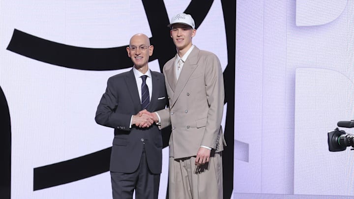 Jun 25, 2025; Brooklyn, NY, USA; Egor Demin stands with NBA commissioner Adam Silver after being selected as the eighth pick by the Brooklyn Nets in the first round of the 2025 NBA Draft at Barclays Center. Mandatory Credit: Brad Penner-Imagn Images Jun 25, 2025; Brooklyn, NY, USA; Egor Demin stands with NBA commissioner Adam Silver after being selected as the eighth pick by the Brooklyn Nets in the first round of the 2025 NBA Draft at Barclays Center. Mandatory Credit: Brad Penner-Imagn Images