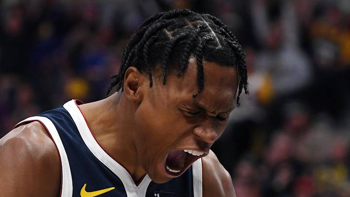 Denver Nuggets guard Peyton Watson (8) celebrates after dunking the ball against Phoenix Suns center Khaman Maluach (10) during the first half at Ball Arena on October 25, 2025.