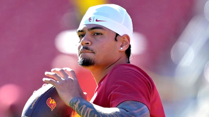Oct 11, 2025; Los Angeles, California, USA;  USC Trojans quarterback Jayden Maiava (14) warms up prior to the game against the Michigan Wolverines at United Airlines Field at the Los Angeles Memorial Coliseum. Mandatory Credit: Jayne Kamin-Oncea-Imagn Images
