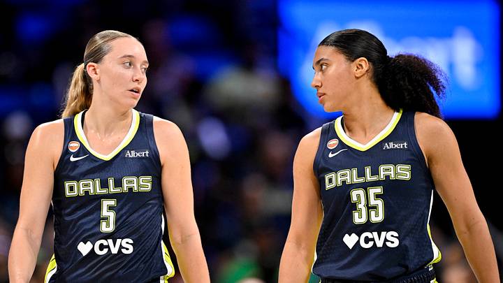 Dallas Wings guard Paige Bueckers (5) and guard Azzi Fudd (35) walk back onto the court. Dallas Wings guard Paige Bueckers (5) and guard Azzi Fudd (35) walk back onto the court.