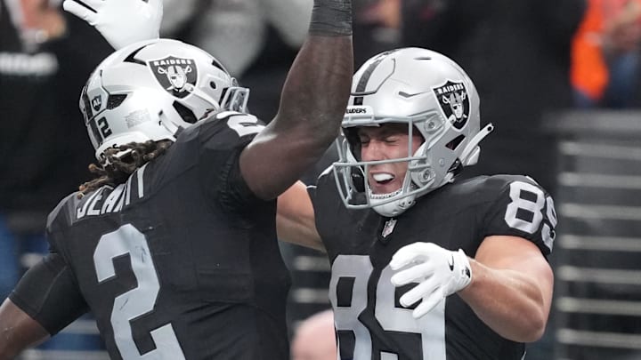Dec 7, 2025; Paradise, Nevada, USA;  Las Vegas Raiders tight end Brock Bowers (89) reacts with running back Ashton Jeanty (2) after catching a touchdown against the Denver Broncos during the first half at Allegiant Stadium. Mandatory Credit: Kirby Lee-Imagn Images