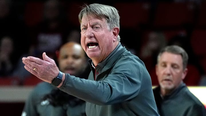 NC State coach Wes Moore gestures during a women's college basketball game between the University of Oklahoma Sooners (OU) and the NC State Wolfpack at Lloyd Noble Center in Norman, Okla., Wednesday, Dec. 3, 2025. Oklahoma won 103-98.