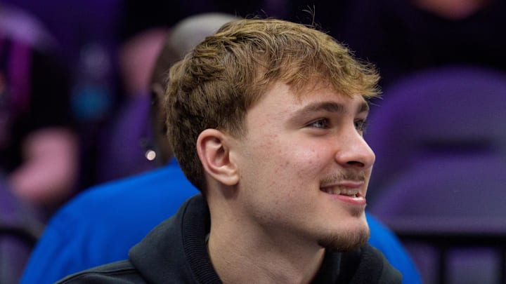 Dallas Mavericks forward Cooper Flagg watches the second quarter against the Minnesota Timberwolves. Dallas Mavericks forward Cooper Flagg watches the second quarter against the Minnesota Timberwolves.