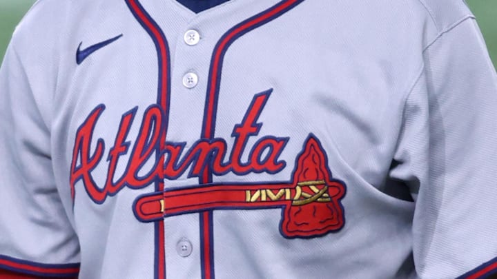 The Atlanta Braves logo on first base Matt Olson's jersey during a July 2025 game