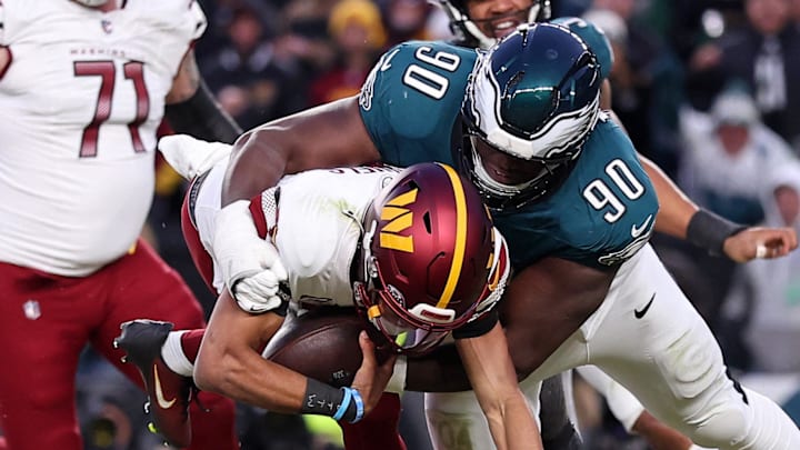 Philadelphia Eagles defensive tackle Jordan Davis sacks Washington Commanders quarterback Jayden Daniels. Philadelphia Eagles defensive tackle Jordan Davis sacks Washington Commanders quarterback Jayden Daniels.