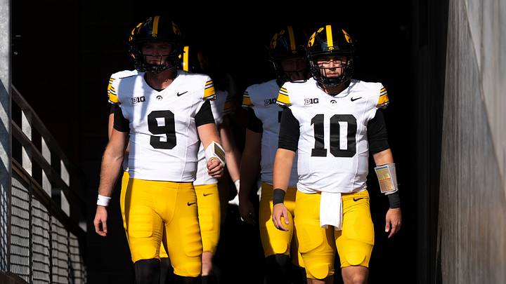 Iowa Hawkeyes quarterback Hank Brown (9) and Iowa Hawkeyes quarterback Jeremy Hecklinski (10) walk out onto the field Oct. 24, 2026 for a Big Ten football game against the Minnesota Golden Gophers in Minneapolis, Minnesota. Iowa Hawkeyes quarterback Hank Brown (9) and Iowa Hawkeyes quarterback Jeremy Hecklinski (10) walk out onto the field Oct. 24, 2026 for a Big Ten football game against the Minnesota Golden Gophers in Minneapolis, Minnesota.